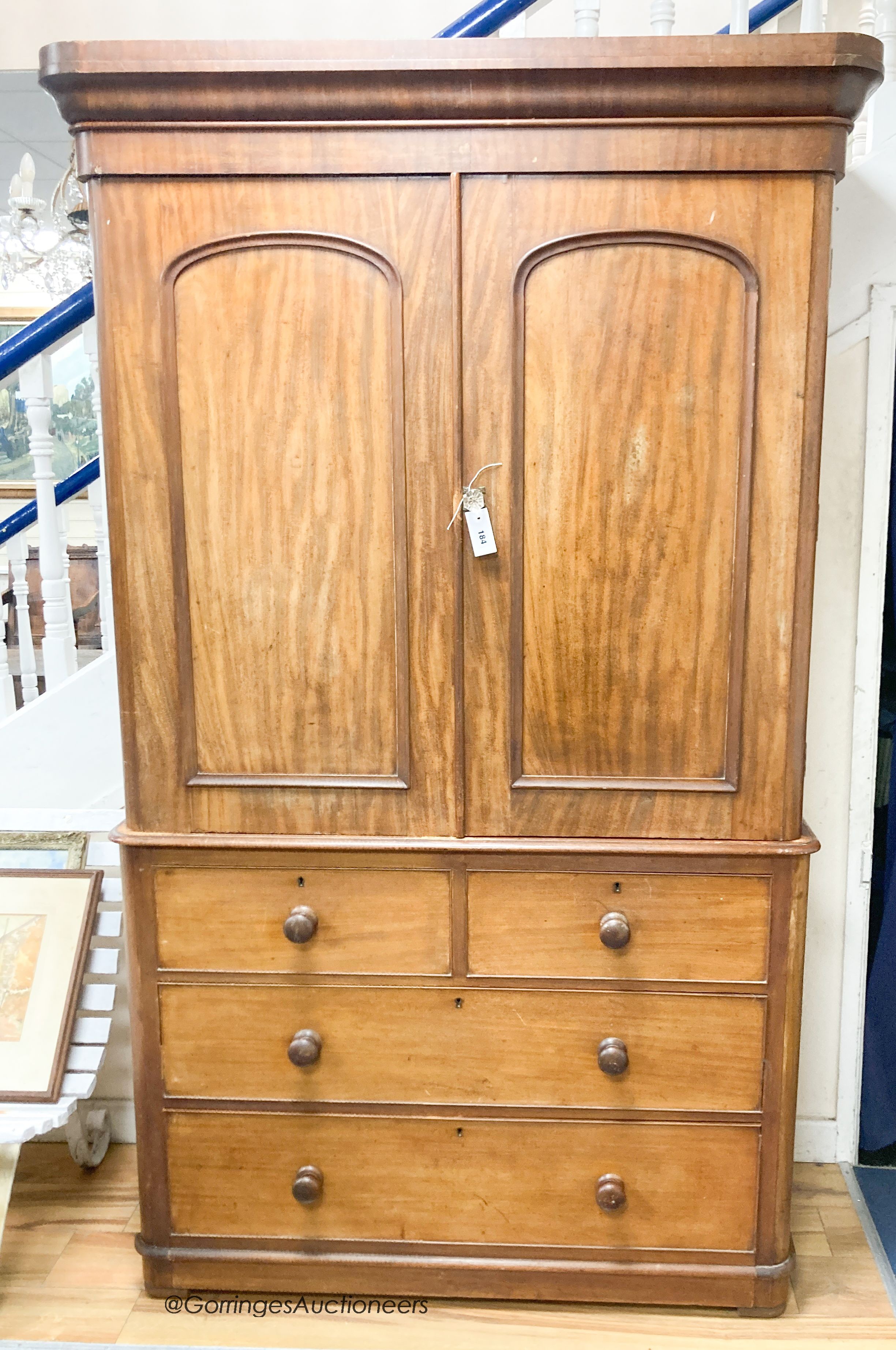 A late Victorian mahogany linen press, length 122cm, depth 55cm, height 209cm